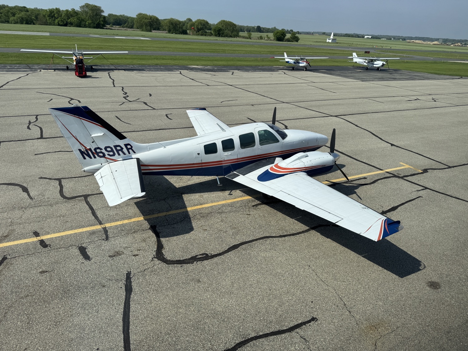 Beechcraft Baron 58 seen from above on the ramp